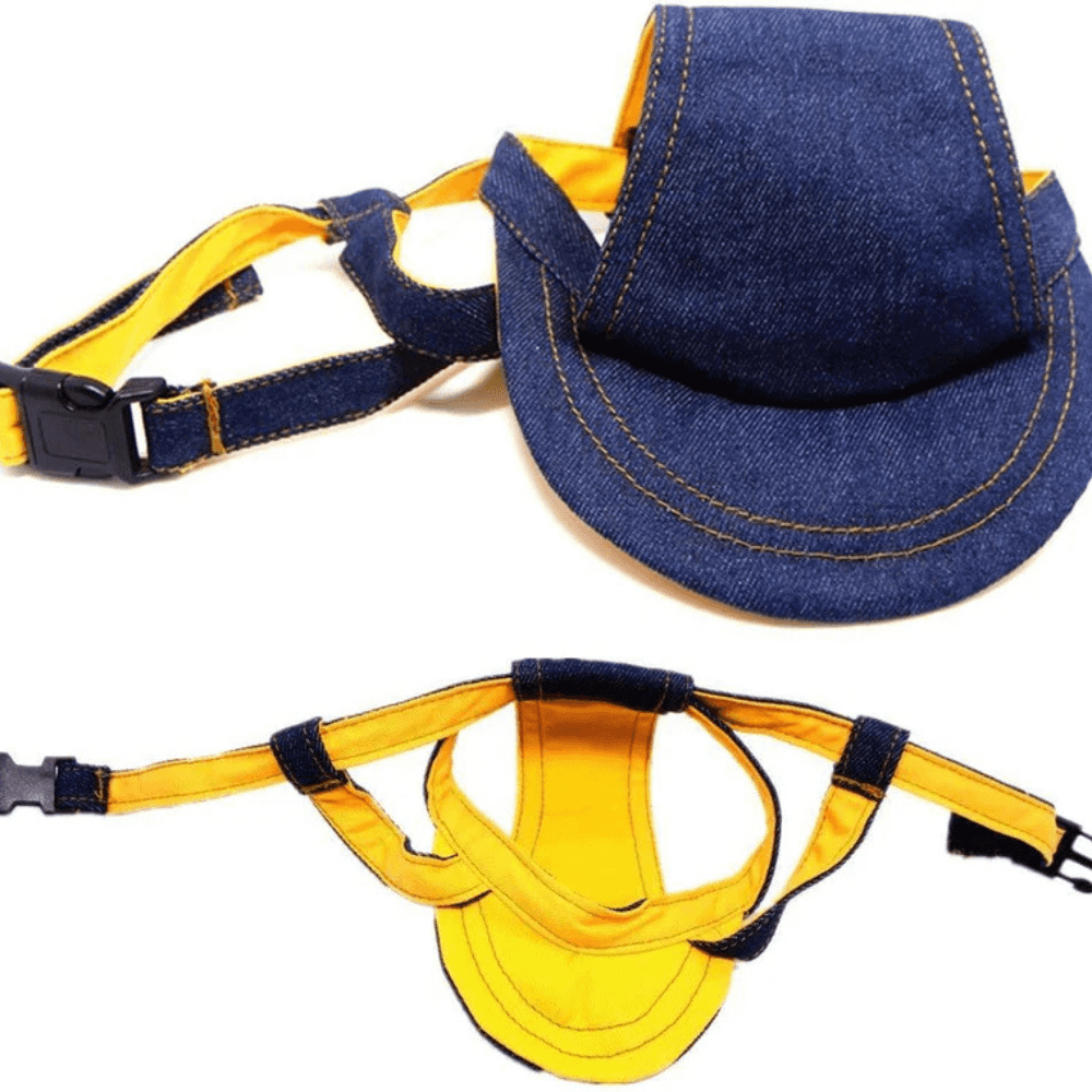 Denim Dog Cap - Durable Dog Hat for All Seasons laid flat showing adjustable straps and breathable yellow interior for comfort.