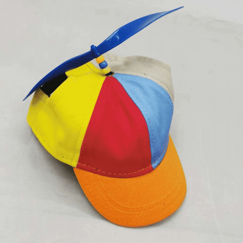 Bright Dog Propeller Hat with orange brim and blue spinning top, designed for stylish sun protection in pet apparel collections.